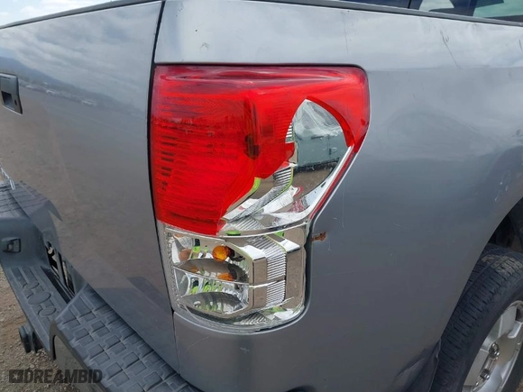 2010 Toyota Tundra 2WD Truck with VIN 5TFRM5F12AX011275, listed as a IAAI auction lot 41871927 with 252,014 mi miles. Bid and sale history available at carsss.com. Image 6.