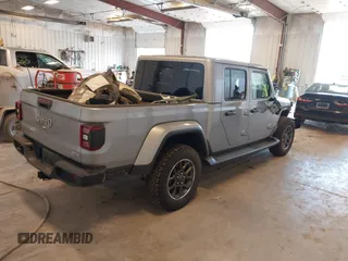 2021 Jeep Gladiator High Altitude with VIN 1C6HJTFG1ML556741, listed as a IAAI auction lot 42240680 with 47,926 mi miles and . Bid and sale history available at DreamBid. Image 4.