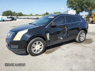 2013 Cadillac SRX Luxury Collection z VIN 3GYFNCE32DS514098, wystawiony jako Copart lot #52970845 z przebiegiem 148 696 mil mil oraz Szkody całkowita. Historia ofert i sprzedaży dostępna na DreamBid. Obrazek 1.