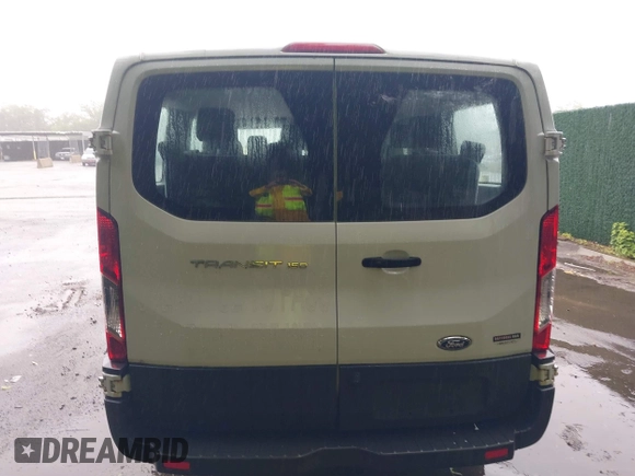 2016 Ford Transit XL z VIN 1FMZK1ZM6GKB29173, wystawiony jako IAAI lot #42388672 z przebiegiem 108 076 mil mil oraz . Historia ofert i sprzedaży dostępna na DreamBid. Obrazek 16.