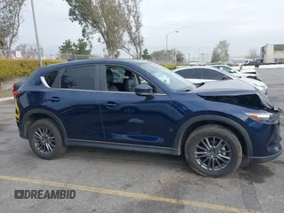 2019 Mazda CX-5 Touring with VIN JM3KFACM5K0697137, listed as a IAAI auction lot 41720253 with 50,416 mi miles. Bid and sale history available at carsss.com. Image 13.
