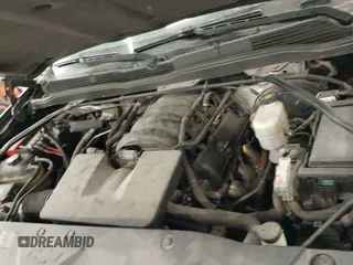 2015 Chevrolet Silverado 1500 LT with VIN 1GCVKREH4FZ338993, listed as a IAAI auction lot 41156103 with 68,676 mi miles and . Bid and sale history available at DreamBid. Image 22.