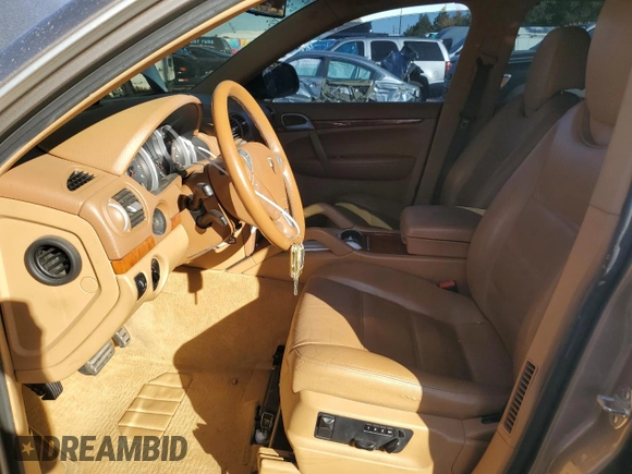 2006 Porsche Cayenne S with VIN WP1AB29P56LA64728, listed as a Copart auction lot 77499284 with 191,650 mi miles and Salvage Title. Bid and sale history available at carsss.com. Image 7.