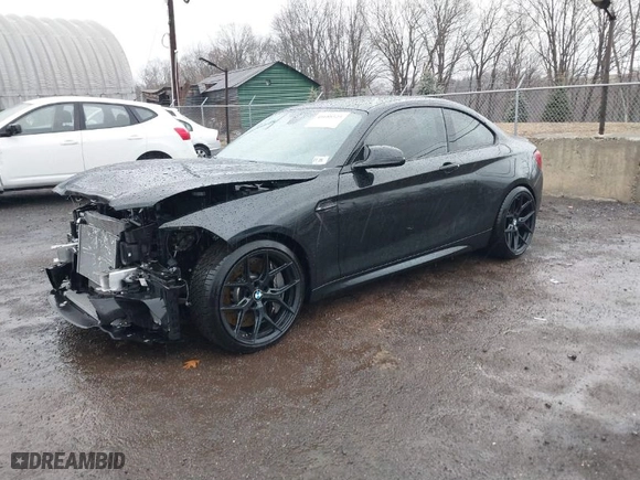 2020 BMW M2 Competition with VIN WBS2U7C05L7E24573, listed as a IAAI auction lot 41688525 with NaN miles. Bid and sale history available at carsss.com. Image 2.