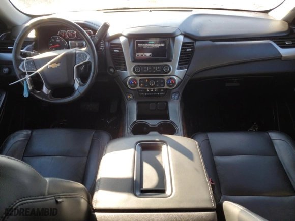 2020 Chevrolet Tahoe LT with VIN 1GNSKBKC1LR248352, listed as a Copart auction lot 82865274 with 73,765 mi miles and Salvage Title. Bid and sale history available at carsss.com. Image 8.