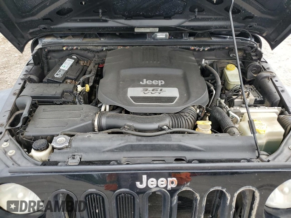 2013 Jeep Wrangler Sport with VIN 1C4AJWAG6DL576549, listed as a Copart auction lot 59888965 with 164,314 mi miles and Salvage title. Bid and sale history available at DreamBid. Image 12.