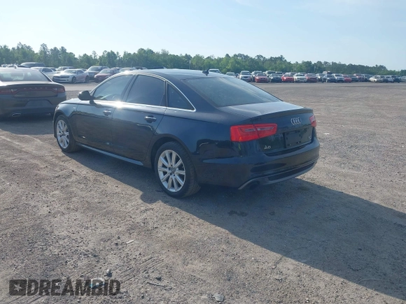 2015 Audi A6 3.0T Prestige with VIN WAUHGAFC3FN011654, listed as a IAAI auction lot 42104153 with 166,719 mi miles. Bid and sale history available at carsss.com. Image 3.