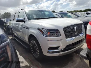 2020 Lincoln Navigator Black Label z VIN 5LMJJ3TT4LEL21595, wystawiony jako Copart lot #73951494 z przebiegiem Nie podano mil oraz Szkoda całkowita • Salvage title. Historia ofert i sprzedaży dostępna na DreamBid. Obrazek 4.