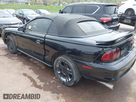 1996 Ford Mustang GT with VIN 1FALP45X0TF133385, listed as a IAAI auction lot 42060901 with 205,228 mi miles and . Bid and sale history available at DreamBid. Image 3.