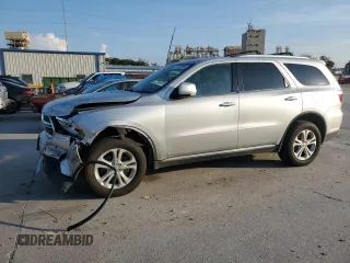 2013 Dodge Durango Crew with VIN 1C4RDHDG1DC616909, listed as a Copart auction lot 61923565 with 98,264 mi miles and Salvage title. Bid and sale history available at DreamBid. Image 1.