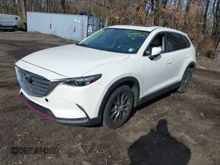 2016 Mazda CX-9 Touring with VIN JM3TCBCY4G0100511, listed as a IAAI auction lot 41811185 with 112,932 mi miles. Bid and sale history available at carsss.com. Image 2.