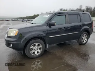 2010 Honda Pilot Touring z VIN 5FNYF4H90AB004614, wystawiony jako Copart lot #60342195 z przebiegiem 211 457 mil mil oraz Czysty tytuł • Clean title. Historia ofert i sprzedaży dostępna na DreamBid. Obrazek 1.