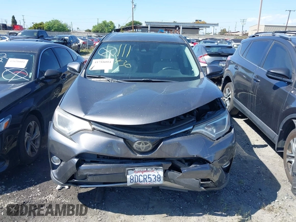 2018 Toyota RAV4 XLE with VIN JTMWFREV6JJ175575, listed as a IAAI auction lot 41788004 with 112,577 mi miles. Bid and sale history available at carsss.com. Image 12.