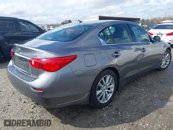 2015 Infiniti Q50 with VIN JN1BV7AP2FM332816, listed as a IAAI auction lot 41864532 with 180,683 mi miles. Bid and sale history available at carsss.com. Image 4.