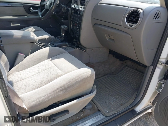 2007 GMC Envoy SLE with VIN 1GKDS13S772142847, listed as a IAAI auction lot 41605904 with 131,564 mi miles. Bid and sale history available at carsss.com. Image 5.