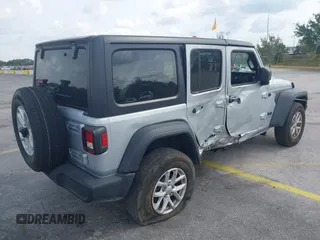 2023 Jeep Wrangler Sport S with VIN 1C4HJXDNXPW702199, listed as a IAAI auction lot 41859413 with 24,942 mi miles and . Bid and sale history available at DreamBid. Image 4.