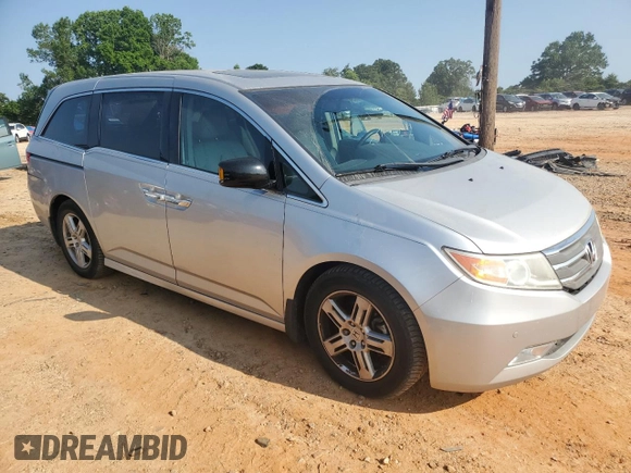 2012 Honda Odyssey Touring с VIN 5FNRL5H93CB137468, выставлен на аукционе Copart как лот 59330545 с пробегом 105 880 миль миль и Списание • Salvage title. История ставок и продаж доступна на DreamBid. Изображение 4.