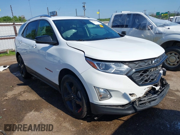2021 Chevrolet Equinox Premier z VIN 2GNAXNEV9M6120241, wystawiony jako IAAI lot #42222928 z przebiegiem 104 274 mil mil oraz . Historia ofert i sprzedaży dostępna na DreamBid. Obrazek 1.