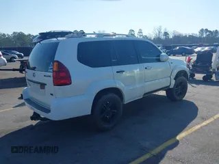 2004 Lexus GX 470 with VIN JTJBT20XX40063036, listed as a IAAI auction lot 41780865 with 222,285 mi miles. Bid and sale history available at carsss.com. Image 4.