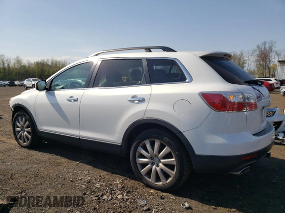 2010 Mazda CX-9 Grand Touring z VIN JM3TB3MV4A0215694, wystawiony jako Copart lot #54254805 z przebiegiem 168 263 mil mil oraz Szkoda całkowita • Salvage title. Historia ofert i sprzedaży dostępna na DreamBid. Obrazek 2.