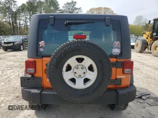 2011 Jeep Wrangler Sport with VIN 1J4AA2D15BL574234, listed as a Copart auction lot 52952605 with 114,642 mi miles and Salvage Title. Bid and sale history available at carsss.com. Image 6.