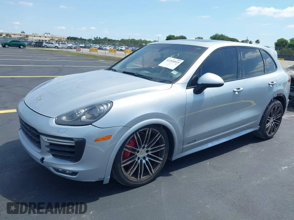 2016 Porsche Cayenne GTS z VIN WP1AD2A27GLA76018, wystawiony jako IAAI lot #42209515 z przebiegiem 49 432 mil mil oraz . Historia ofert i sprzedaży dostępna na DreamBid. Obrazek 2.