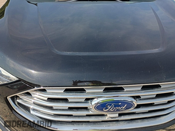 2019 Ford Edge Titanium with VIN 2FMPK4K91KBC09840, listed as a IAAI auction lot 42870883 with 118,778 mi miles and . Bid and sale history available at DreamBid. Image 4.