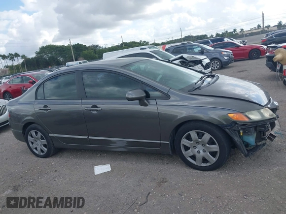 2009 Honda Civic LX z VIN 2HGFA16599H369479, wystawiony jako IAAI lot #41489267 z przebiegiem 143 297 mil mil oraz . Historia ofert i sprzedaży dostępna na DreamBid. Obrazek 13.