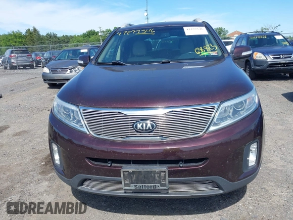 2015 Kia Sorento LX z VIN 5XYKTCA60FG638823, wystawiony jako IAAI lot #42277546 z przebiegiem 147 444 mil mil oraz . Historia ofert i sprzedaży dostępna na DreamBid. Obrazek 12.