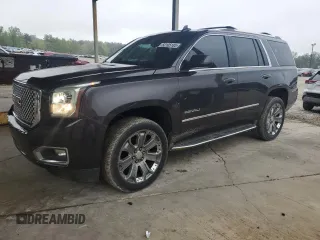 2016 GMC Yukon Denali with VIN 1GKS2CKJ0GR366206, listed as a Copart auction lot 52105185 with 150,141 mi miles and Salvage Title. Bid and sale history available at carsss.com. Image 1.