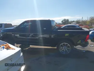 2015 Ram 1500 Express z VIN 1C6RR6KT1FS517948, wystawiony jako IAAI lot #41355978 z przebiegiem 94 784 mil mil oraz . Historia ofert i sprzedaży dostępna na DreamBid. Obrazek 14.