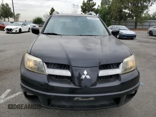 2006 Mitsubishi Outlander SE with VIN JA4LX41F36U052222, listed as a Copart auction lot 65640484 with 167,989 mi miles and Salvage Title. Bid and sale history available at carsss.com. Image 5.