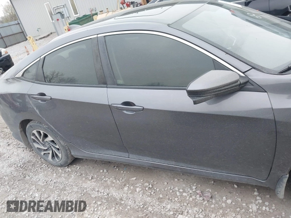 2018 Honda Civic EX with VIN 2HGFC2F79JH570403, listed as a IAAI auction lot 42018123 with 165,821 mi miles and . Bid and sale history available at DreamBid. Image 13.