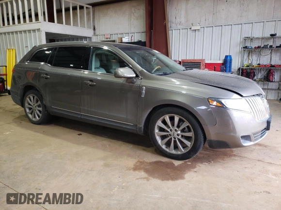 2012 Lincoln MKT EcoBoost with VIN 2LMHJ5AT5CBL54931, listed as a Copart auction lot 45279195 with 82,853 mi miles and Salvage Title. Bid and sale history available at DreamBid. Image 4.