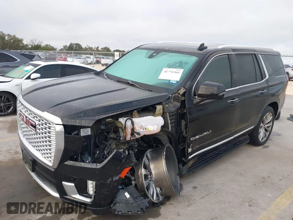 2021 GMC Yukon Denali with VIN 1GKS2DKL3MR308321, listed as a IAAI auction lot 41771365 with 63,415 mi miles. Bid and sale history available at carsss.com. Image 19.