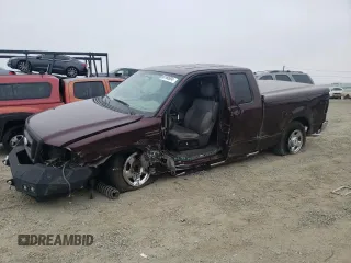 2005 Ford F-150 STX with VIN 1FTRX12W55KB45878, listed as a Copart auction lot 66160994 with 128,212 mi miles and Salvage Title. Bid and sale history available at carsss.com. Image 1.