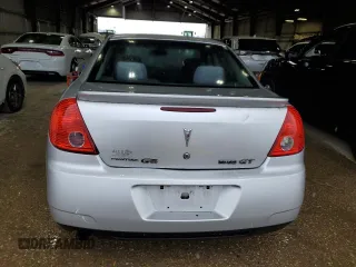 2009 Pontiac G6 GT 1SB z VIN 1G2ZK57K694233980, wystawiony jako Copart lot #54146815 z przebiegiem 96 973 mil mil oraz Szkoda całkowita • Salvage title. Historia ofert i sprzedaży dostępna na DreamBid. Obrazek 6.