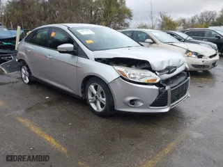 2014 Ford Focus SE with VIN 1FADP3F20EL406508, listed as a IAAI auction lot 40809098 with 89,731 mi miles. Bid and sale history available at carsss.com. Image 1.