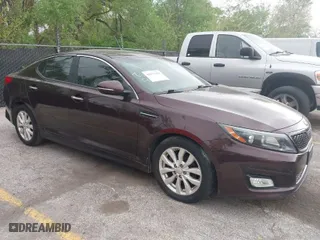2014 Kia Optima EX with VIN 5XXGN4A71EG321621, listed as a IAAI auction lot 42077320 with 169,372 mi miles. Bid and sale history available at carsss.com. Image 1.