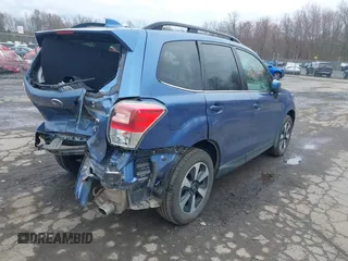 2018 Subaru Forester Limited with VIN JF2SJAJC4JH525104, listed as a IAAI auction lot 42018479 with 97,843 mi miles. Bid and sale history available at carsss.com. Image 4.