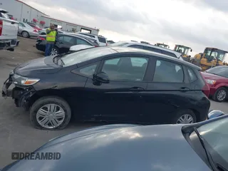 2020 Honda Fit LX z VIN 3HGGK5H40LM717305, wystawiony jako IAAI lot #42093169 z przebiegiem 69 665 mil mil oraz . Historia ofert i sprzedaży dostępna na DreamBid. Obrazek 14.