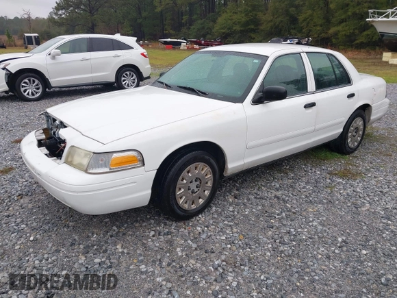 2005 Ford Police Interceptor z VIN 2FAFP71W25X139210, wystawiony jako IAAI lot #41609177 z przebiegiem 114 755 mil mil oraz . Historia ofert i sprzedaży dostępna na DreamBid. Obrazek 17.