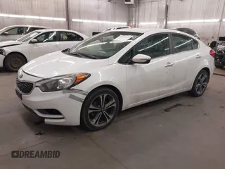 2014 Kia Forte EX with VIN KNAFX4A80E5205536, listed as a IAAI auction lot 41882012 with 103,641 mi miles. Bid and sale history available at carsss.com. Image 2.