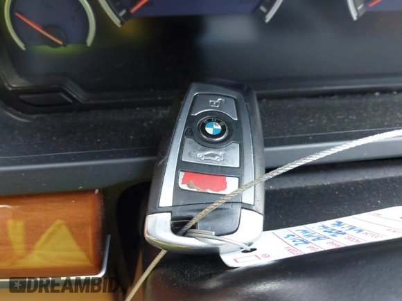 2013 BMW 7 Series 750Li with VIN WBAYE8C55DDS16013, listed as a IAAI auction lot 42709519 with 123,405 mi miles and . Bid and sale history available at DreamBid. Image 11.