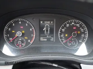 2012 Volkswagen Passat SE z VIN 1VWBP7A31CC099045, wystawiony jako IAAI lot #42063773 z przebiegiem 166 998 mil mil oraz . Historia ofert i sprzedaży dostępna na DreamBid. Obrazek 16.