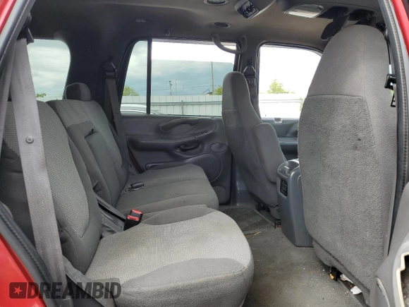 1999 Ford Expedition XLT z VIN 1FMRU1869XLC10336, wystawiony jako Copart lot #55728985 z przebiegiem Nie podano mil oraz Szkoda całkowita • Salvage title. Historia ofert i sprzedaży dostępna na DreamBid. Obrazek 11.