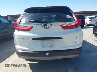 2018 Honda CR-V LX with VIN 2HKRW5H31JH408187, listed as a IAAI auction lot 41623448 with 177,661 mi miles and . Bid and sale history available at DreamBid. Image 16.