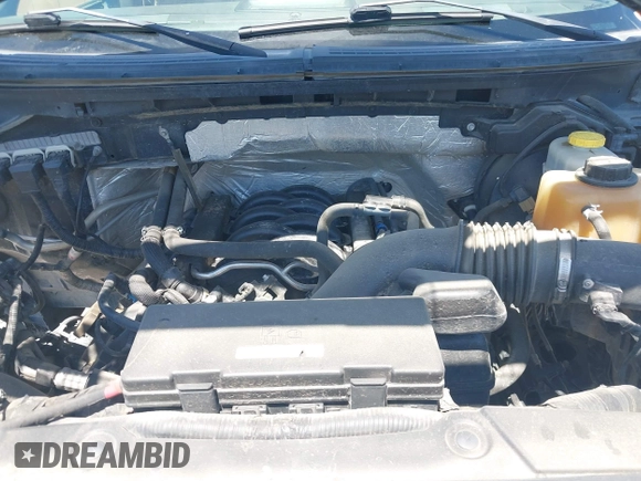 2014 Ford F-150 XL with VIN 1FTFW1EF1EKE11155, listed as a IAAI auction lot 42013793 with 245,476 mi miles and . Bid and sale history available at DreamBid. Image 10.