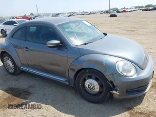 2014 Volkswagen Beetle 2.5L with VIN 3VWJX7AT7EM608634, listed as a IAAI auction lot 41783090 with 139,106 mi miles and . Bid and sale history available at DreamBid. Image 6.