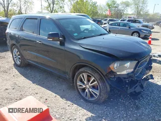 2013 Dodge Durango R/T z VIN 1C4SDJCT5DC665912, wystawiony jako IAAI lot #42199314 z przebiegiem 206 069 mil mil oraz . Historia ofert i sprzedaży dostępna na DreamBid. Obrazek 1.